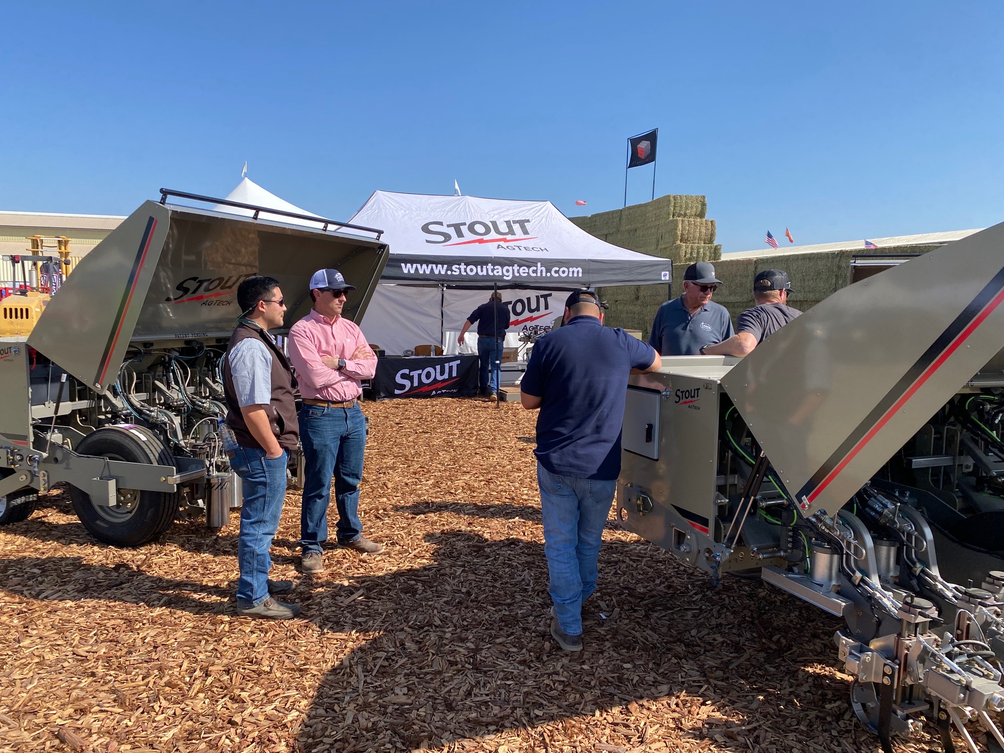  The Stout Agtech team shows its smart cultivators to growers. The cultivators use artificial intelligence and vision technology to eliminate weeds and cultivate soil. 