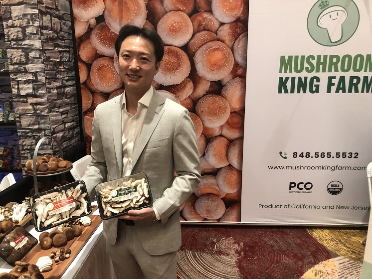  Joshua Ho, CEO of Mushroom King Farms, with operations in California and New Jersey, exhibits on The Packer's GOPEX 2022 expo floor. Ho said the company was showcasing its premium donko organic shiitake mushrooms.  The farm is able to grow extra-large shiitake mushrooms that find consistent demand, he said.
