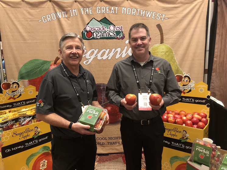  Jay Dyer, senior category manager for the East Coast for Chelan Fresh, Chelan, Wash.,  and Kevin Stennes, organic Manager, display organic Rockit and SugarBee apples at The Packer's 2022 Global Organic Produce Expo.
Dyer said both apple varieties are selling well, with the SugarBee delivering the crunch and crispness of the Honeycrisp but with a little more density. The Rockit, meanwhile, is a small apple that is perfect for young consumers and for snacking.

