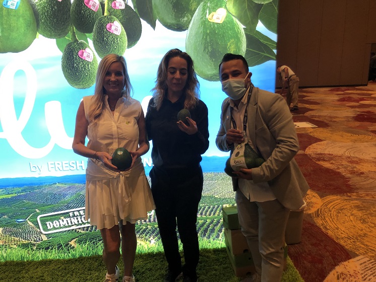  Kristyn Lawson, sales and marketing with Luv Fruits, with Sabrina Castillo, chief administrative officer and Carlos Cuervo, account representative. 