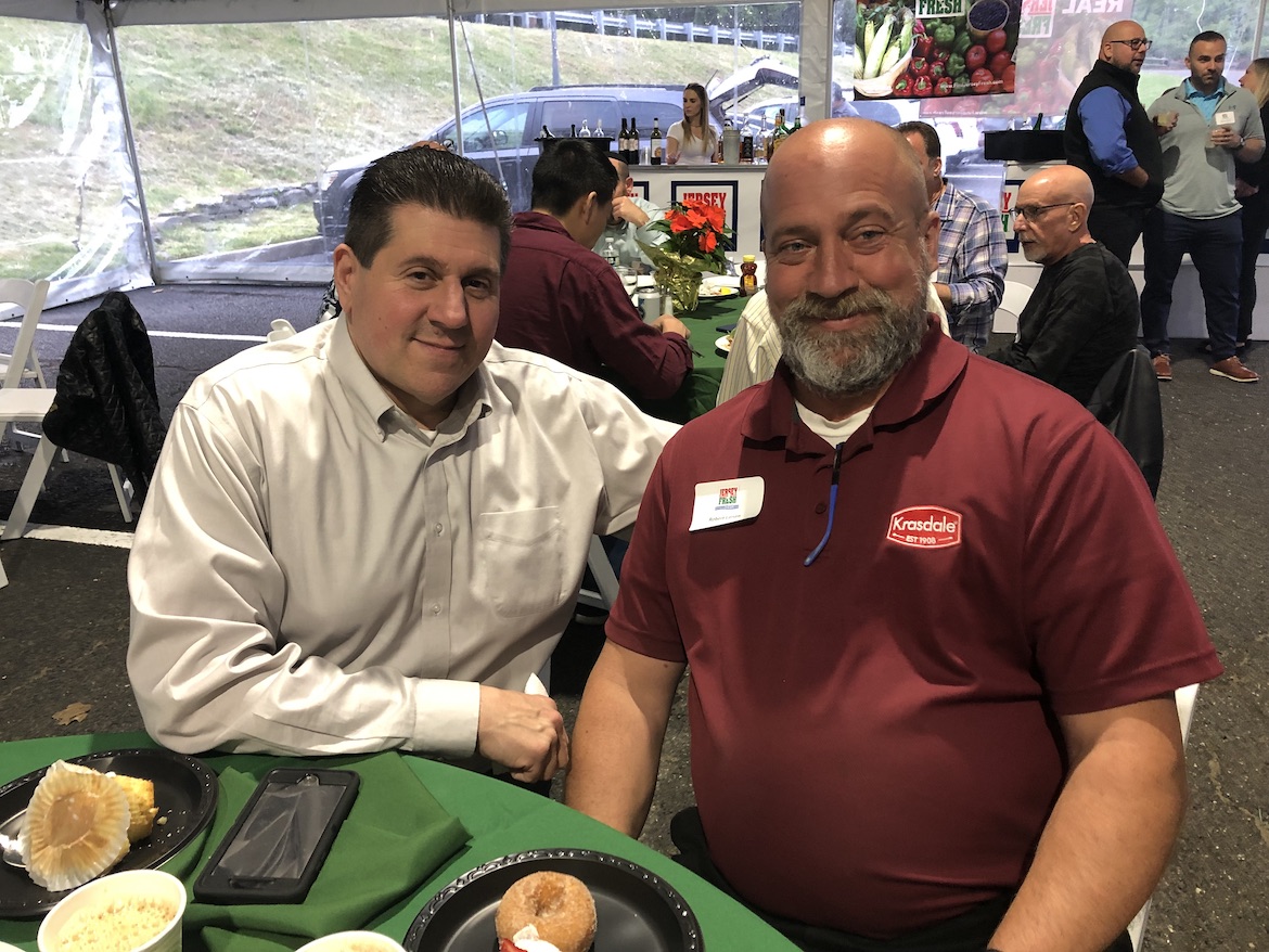  Lou Scagnelli and Robert Larsen of Alpha 1 Marketing attend the EPC barbecue.