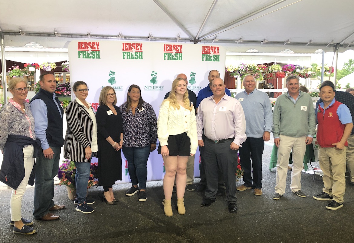  Molly Bender, daughter of EPC member Derrick Bender of Fowler Packing (both front and center), won the annual scholarship from the James and Theresa Nolan Family Foundation Scholarship Program, which asks students to share about an ethical dilemma and how they overcame it.