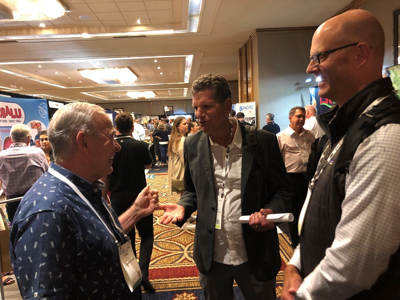 (left to right) Vic Smith, CEO of the JVSmith Companies, Yuma, Ariz. visits with TimYork, CEO of the California Leafy Greens Marketing Agreement and Greg Komar, technical director of the California Leafy Greens Marketing Agreement
