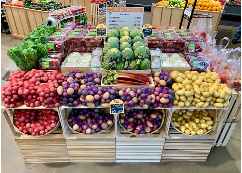 Potatoes don't have to be a blah display. There are enough colors and varieties to have fun with the category, and you can always group them with other interesting items, like artichokes, berries and live basil.