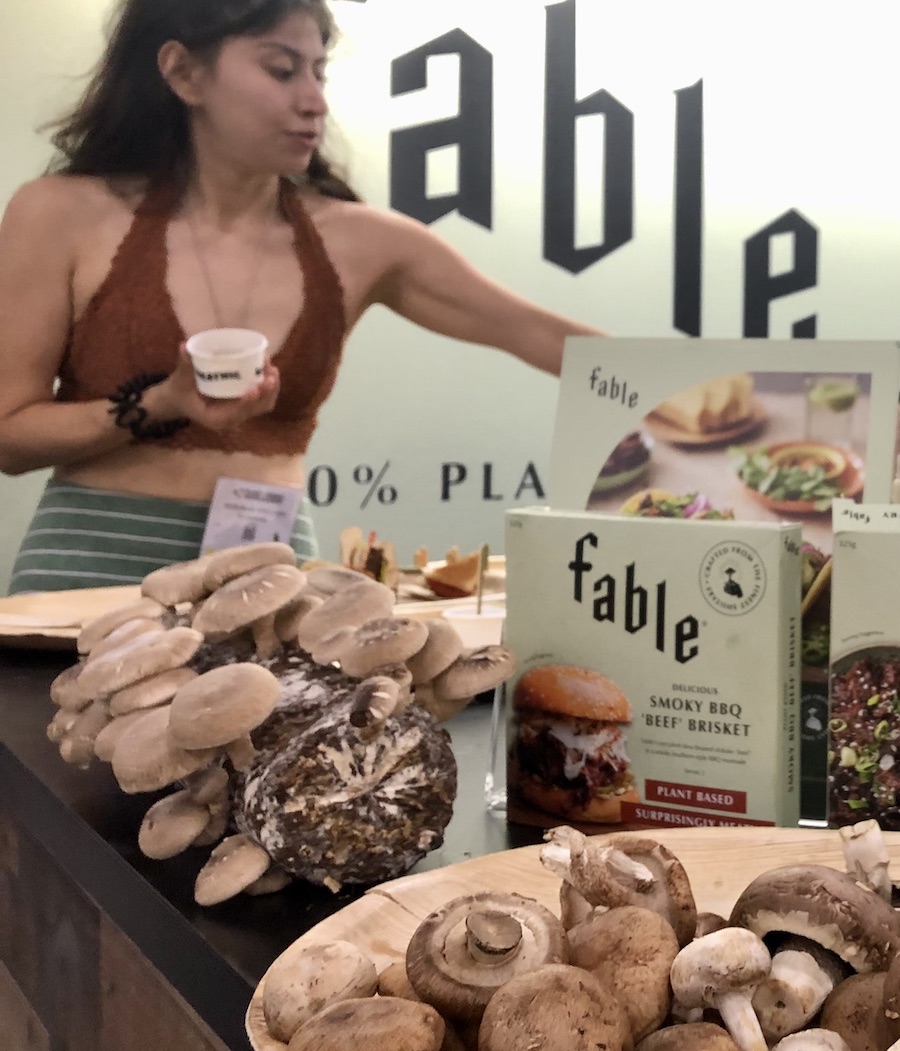  Mushrooms are a hot plant-based alternative item, and Fable was an exhibitor at the show that was very busy, said Dan Joyce, chief growth officer. Deborah William Nanande (pictured) hands out samples of shitake mushrooms.