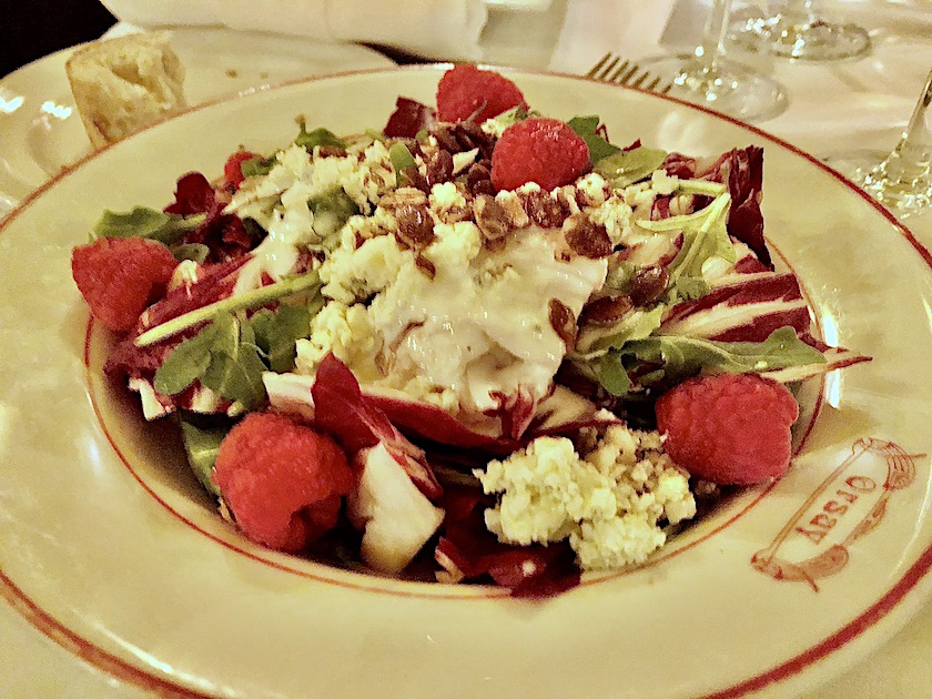  The dinner offered an endive, radicchio, arugula salad with pepitas, raspberries, buttermilk dressing and blue cheese.