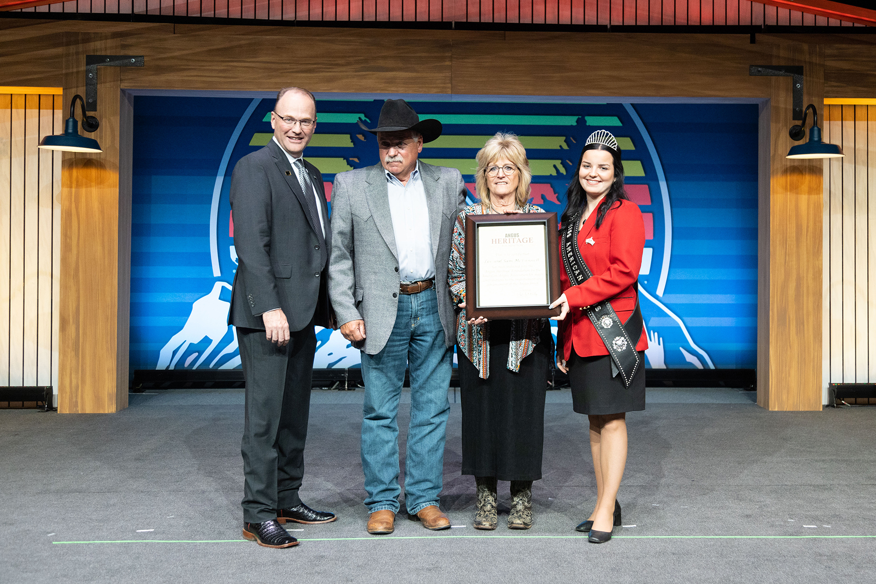  Leo and Sam McDonnell, Columbus, Mont., were inducted into the Angus Heritage Foundation, Nov. 6 during the American Angus Association's Awards Recognition Dinner, at the 2022 Angus Convention in Salt Lake City, Utah. Pictured from left are Mark McCully, American Angus Association CEO Leo McDonnell, Sam McDonnell, Mary Woods, 2022 Miss American Angus.