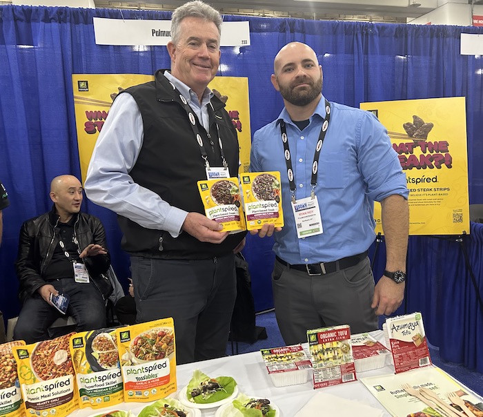 two guys with plant-based steak