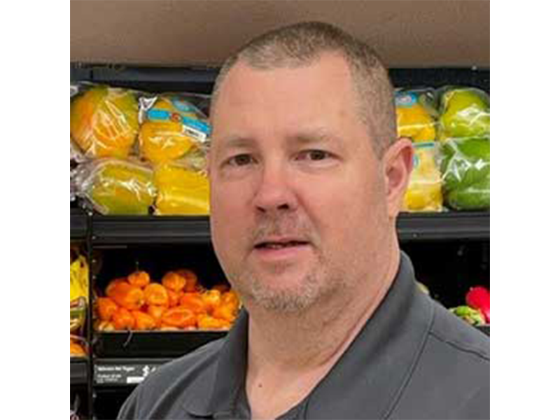 headshot of supermarket produce manager