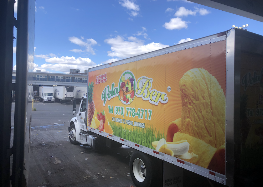 produce truck backed up to Hunts Point Produce Market terminal loading dock