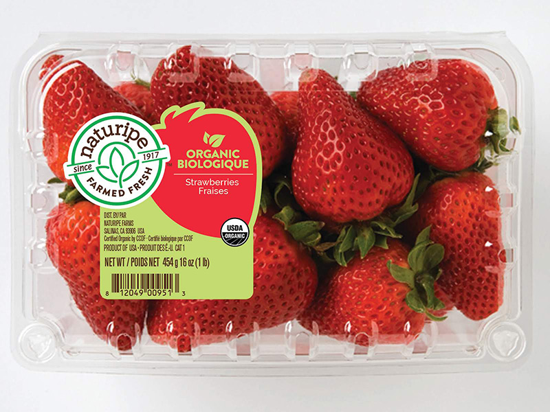 Naturipe organic strawberries in plastic clamshell packaging