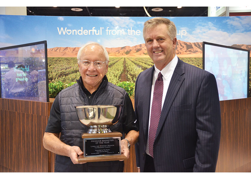 The Wonderful Co.’s Stewart Resnick (left), accepts The Packer's Produce Marketer of the Year award from Tom Karst, editor of The Packer.