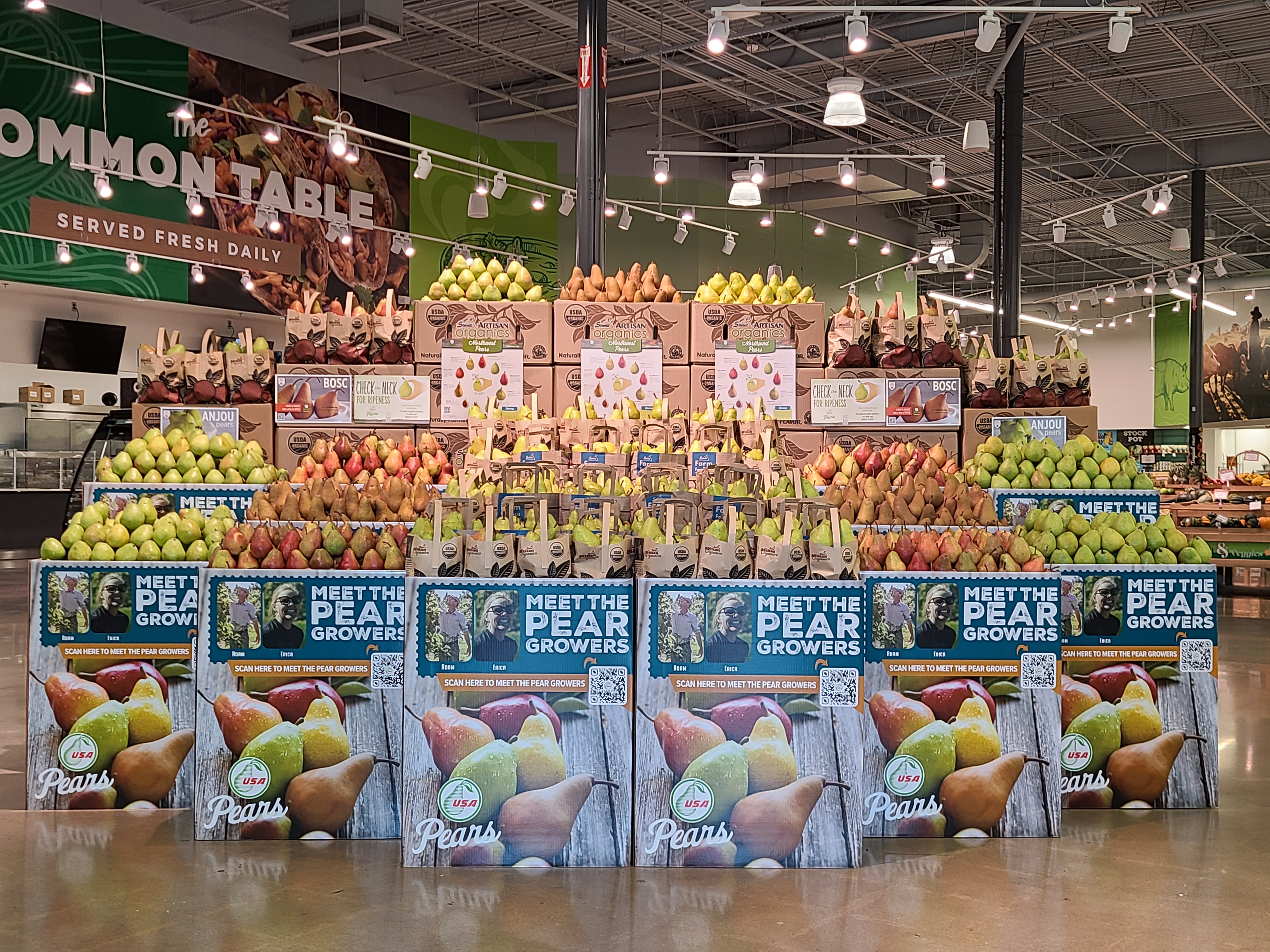 pear display Brian Dey, senior merchandiser at Four Seasons Produce