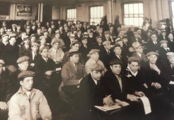 Produce buyers in 1932 wait for the fruit auction to begin in one of the auction sales rooms at the Chicago Produce Terminal.