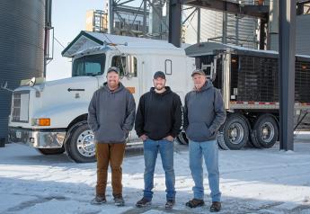 From left, brothers Andrew and Philip Hanna are combining their individual Iowa farm operations with their father, Mark. 