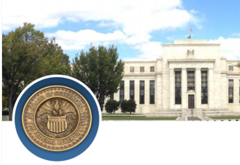  Fed delivers small rate hike, remains vague on future monetary policy moves