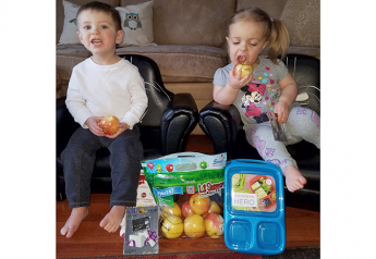 Winners of Stemilt Growers' Snappiest Lil Snapper contest enjoy their prizes.