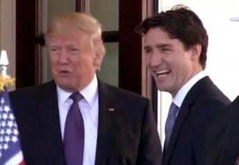 Pres Donald Trump & Canadian Prime Minister Justin Trudeau share a lighter moment in this undated photo. But the smiles were replaced by frowns following the Group of Seven (G-7)  Summit.