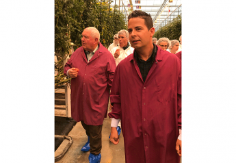 Agriculture Secretary Sonny Perdue (left) and Mastronardi Produce CEO Paul Mastronardi tour the greenhouse grower's Coldwater, Mich., facility in 2018.