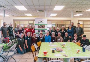 Employees of NatureFresh Farms volunteer at Southwestern Ontario Gleaners, a charitable organization in Leamington, Ontario.