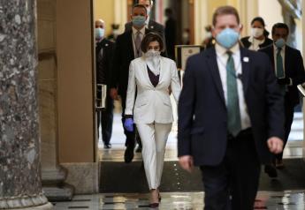 U.S. Speaker of the House Nancy Pelosi (D-CA) wears a face mask as she walks to the House Chamber ahead of a vote on an additional economic stimulus package passed earlier in the week by the U.S. Senate, on Capitol Hill in Washington, U.S., April 23, 2020. REUTERS/Tom Brenner