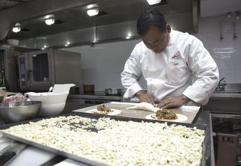 A chef prepares pizza pockets.