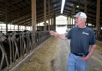 This April 11, 2019 photo shows dairy farmer Dwight Raber in Louisville, Ohio. Raber, of Raber Dairy Farms in northeast Ohio's Stark County says he can no longer make a living by milking cows and has lost money the last two years. State statistics show the number of dairy farms in Ohio dropped to fewer than 2,000. 