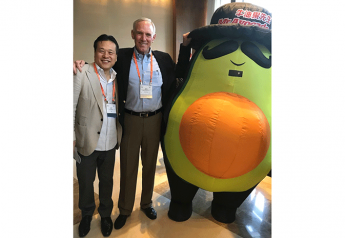 John Wang, CEO of Lantao (left), and Mission Produce President and CEO Steve Barnard, with Mr. Avocado brand mascot Mr. Avocado, at the Produce Marketing Association’s recent Fresh Connections event in Shenzhen, China.