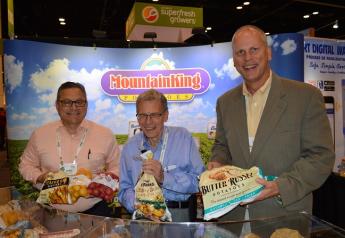  Andre Rohrman, sales representative for Mountain King Potatoes, with Cary Hoffman, president of Mountain King and John Pope, vice president of sales and marketing, with the Houston based company. 