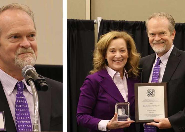 Dr. Robert Larson Receives Award for Meritorious Service