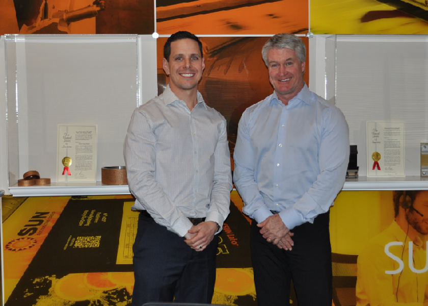 Chris Maisonneuve (left), business development manager at Progressive Systems and Packaging Products, and Mikah Thorne, president of Canadian Corrugated Systems, recently announced a partnership.