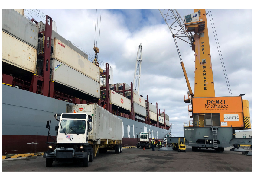 Containers are offloaded from Fresh Del Monte Produce Inc.’s Del Monte Spirit as the energy-efficient vessel makes its Jan. 9 inaugural call at Port Manatee.