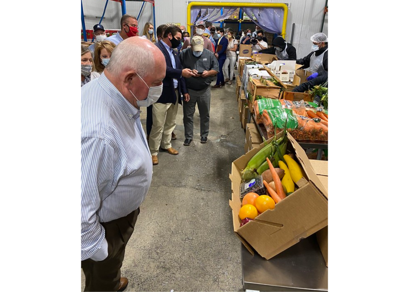 Agriculture Secretary Sonny Perdue surveys a produce box for the USDA's Farmers to Families Food Box Program in 2020. Immediately after the COVID-19 pandemic began, the USDA's Farmers to Families Food Box Program spent billions on sourcing fresh produce and other food for food banks and other outlets. USDA expenditures on produce boxes have dropped dramatically in the last year under The Emergency Food Assistance Program.
