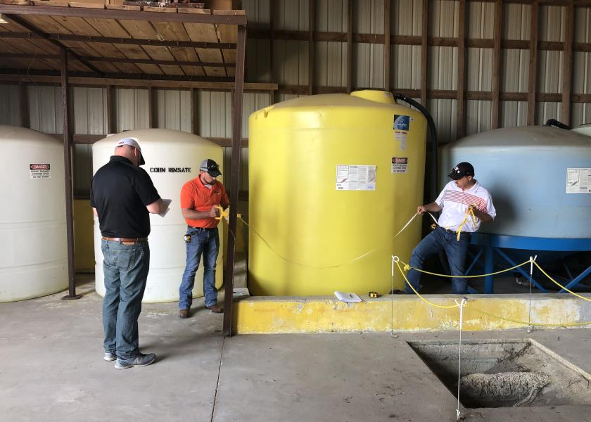 At the Ford West training facility, the ResponsibleAg auditing class is completing the bulk containment mock audit. 