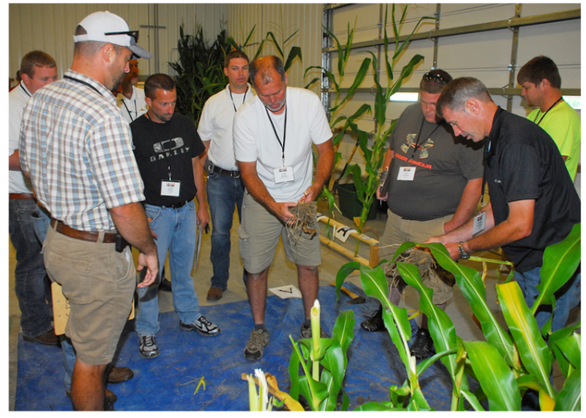Farmers get hands-on information, both in the field and in the classroom.
