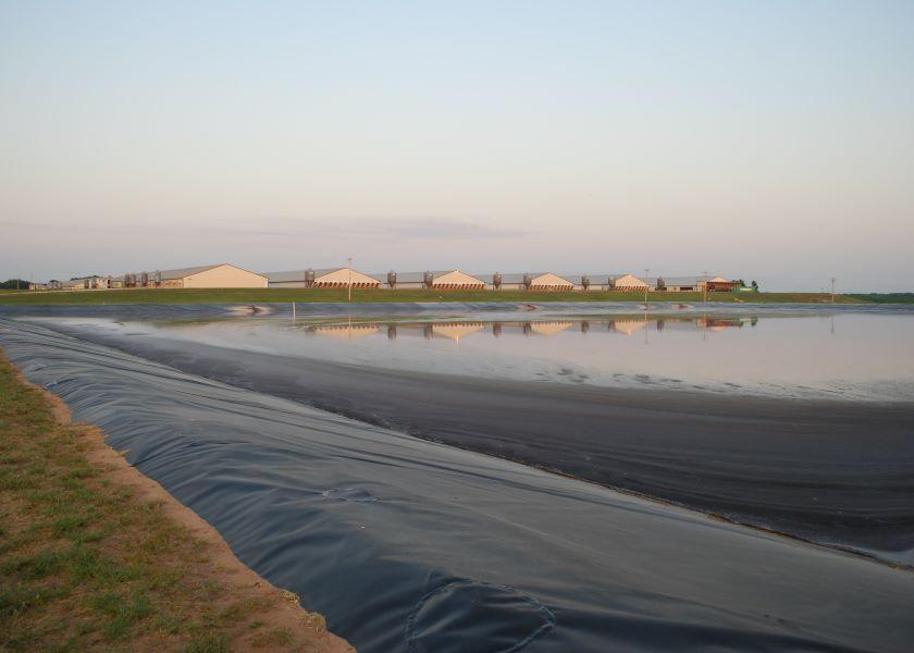 Murphy-Brown LLC sought permits for four hog farms in Duplin and Sampson counties to construct anaerobic waste digestion systems in December 2019. These systems would cover portions of open-air lagoons containing animal waste, enabling the capture of methane and other biogas for energy production. 