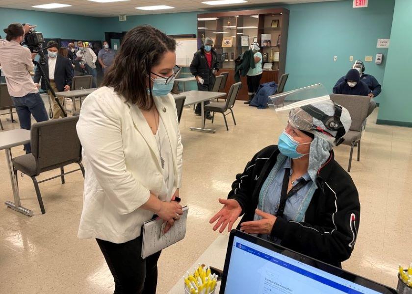 LULAC CEO Sindy Benavides speaks with a Tyson Foods employee during the company’s vaccination event at its Houston, Texas, prepared foods plant on May 14.
