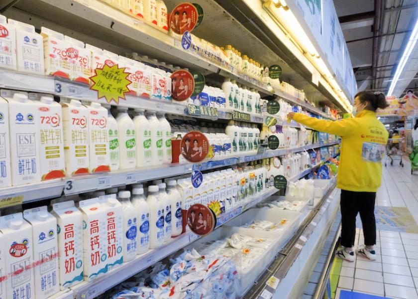 Cartons of milk are displayed on shelves at a supermarket in Beijing, China May 19, 2021. 