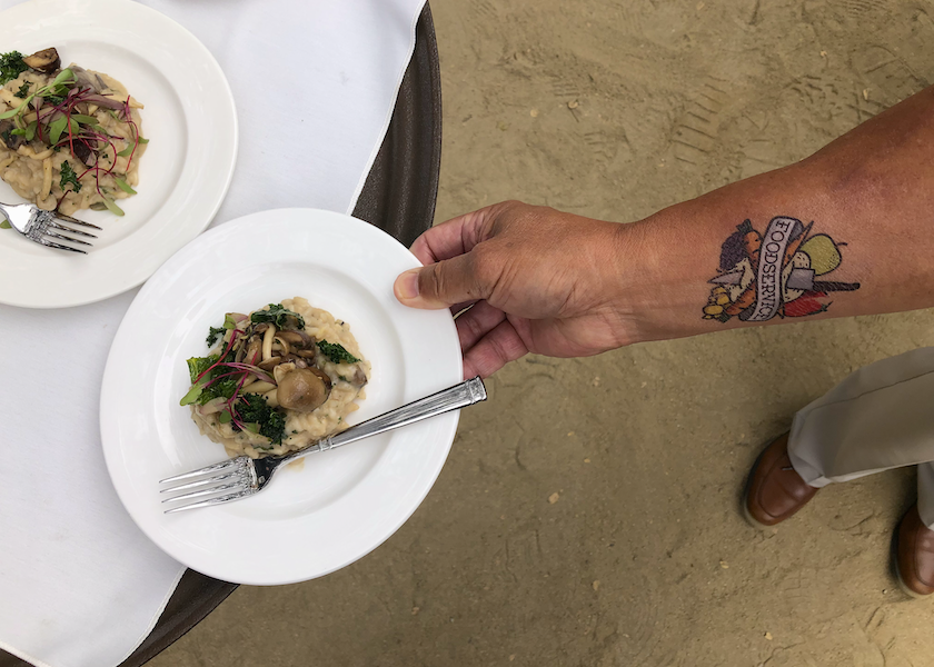 At the closing reception of the July 21-22 PMA Foodservice Conference & Expo in Monterey, Calif., attendees enjoyed garlic mushroom risotto with microgreens, a dish created by Chef Shaun O’Neale — owner and executive chef of Larrea, Las Vegas.