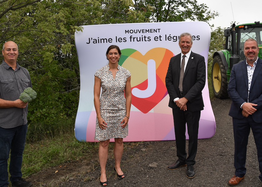 Martin Cousineau, vice-president of sales and marketing at Jardins Cousineau (left to right); Sophie Perreault, Québec Produce Marketing Association president and CEO; André Lamontagne, minister of agriculture, fisheries and food; and Bernard Côté, president of the executive committee at QPMA.