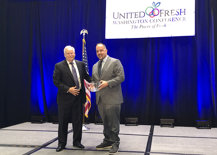 Tom Stenzel (left), president and CEO of United Fresh Produce Association, presented United Fresh's Produce Advocate of the Year award to Christopher Valadez, president of the Grower-Shipper Association.