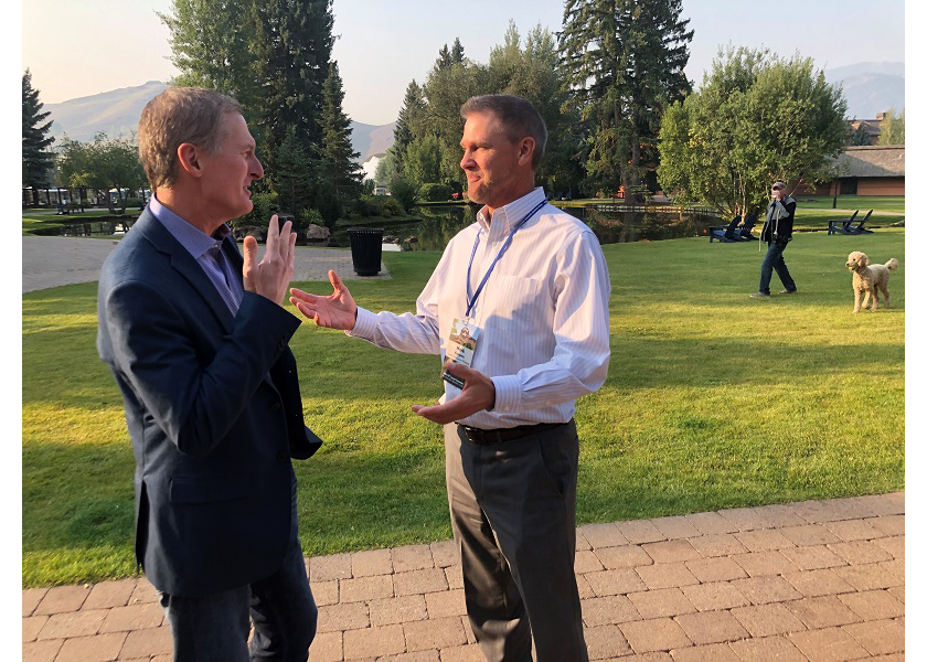  Blair Richardson, president and CEO of Potatoes USA, (left) visits on Sept. 3 with Mark Klompien, president and CEO of the United Potato Growers of America at the Idaho Grower Shippers Association 93rd annual convention.