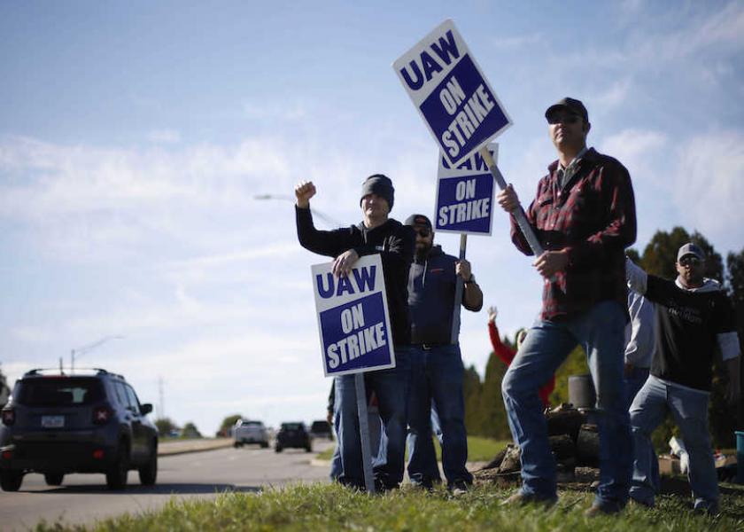 U.S. tractor maker Deere & Co agreed on a new six-year contract with the United Auto Workers (UAW) union that would be subject to a vote by the company's striking workers, the company said in a statement on Saturday.