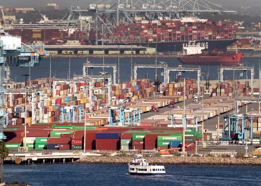Cargo containers wait to be transported after being offloaded at the Port of Los Angeles, Oct 16, 2021 in San Pedro, Calif.