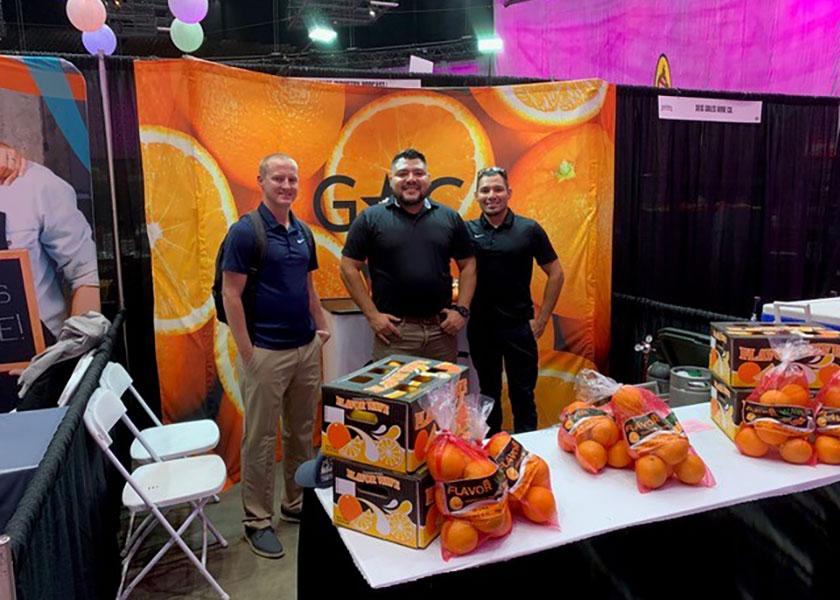 Andrew Mashler (from left), sales manager for Golden Star Citrus; and Michael and Eric Chavez, also in sales, at the first annual Cocina Sabrosa Trade Expo Oct. 4-5.