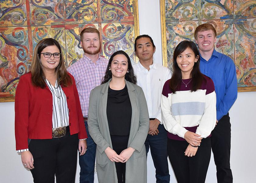 Six students received travel awards from the Pork Checkoff to attend the National Swine Improvement Federation meeting. From left to right: Savannah Millburn, Dalton Obermier, Natalia Galoro Leite, Sungbong Jang, Swan Tan and Zack Peppemeier. Not pictured is "Mark" Jian Cheng who was honored with the Lauren Christian Graduate Student Award.