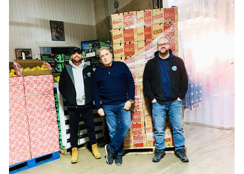 Chicago-area produce suppliers are gearing up for s strong holiday season following a two-year pandemic rollercoaster. “We’re recovering from the shutdown and all the craziness of last year,” said Mark Pappas (center), president of Coosemans Chicago Inc. Pappas, Alec Pappas (left), sales director, and Doug Kawa, general manager, and the team at Coosemans “are on an upward trajectory, but we still have some work to do,” Pappas said. 
 
