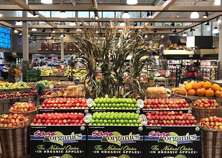 Clearly marked displays of organic produce, including information about flavor profile and where it was grown, can help boost organic sales at retail, says Chuck Sinks, president of sales and marketing at Sage Fruit Co. LLC.