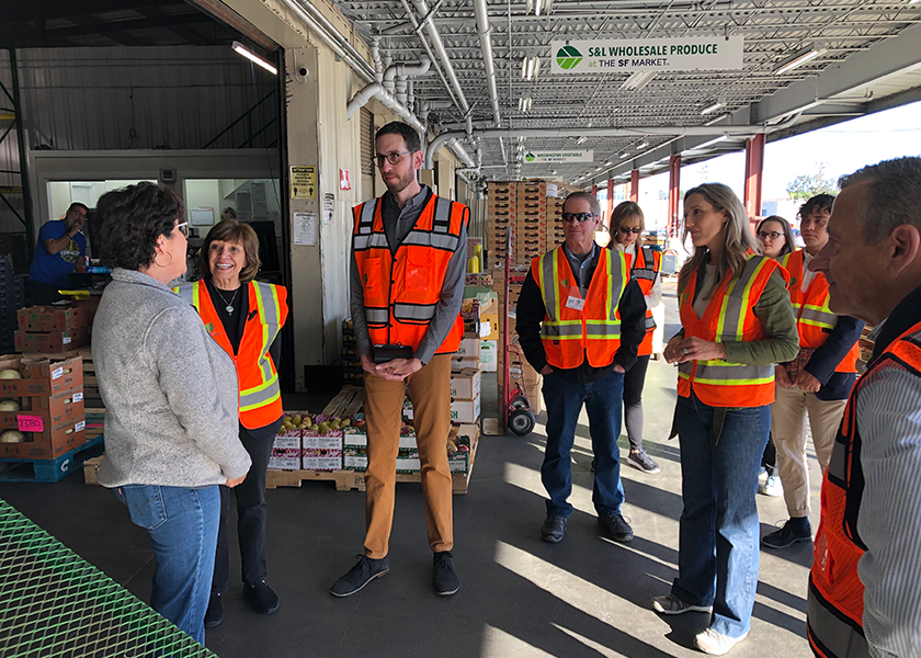 California Department of Food and Agriculture Secretary Karen Ross (left), toured the San Francisco Market. Attendees engaged with several merchant businesses, some of which have been family-run for more than three generations. 