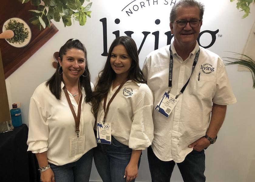 Brittney Bubb (from left), Victoria Kovacevich and Steve Haston talked to 2022 West Coast Produce Expo attendees from their North Shore Living Herbs & Greens booth, while also handing out fresh mint-infused cookies 'n' cream ice cream pops. The show was June 3-4.